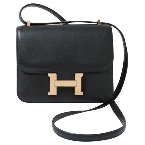 hermes small black purse|Hermes handbags black leather.